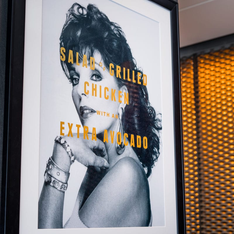 A black and white photo of Joan Collins on the wall of Florentine Restaurant